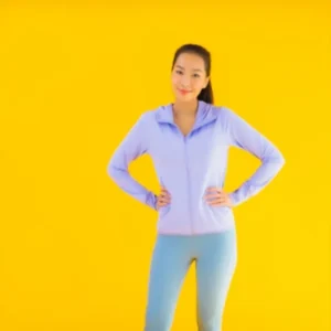 Lavender sports jacket with light blue leggings and white sneakers