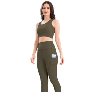 Olive sports bra with matching leggings and black Sneakers.