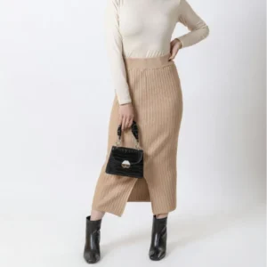 beige knit skirt with white top